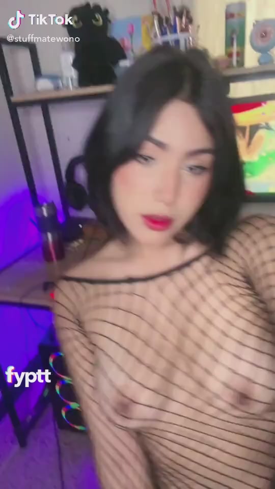 Young Short Hair Brunette Makes Her Tits Look Sexier With A Fishnet Shirt