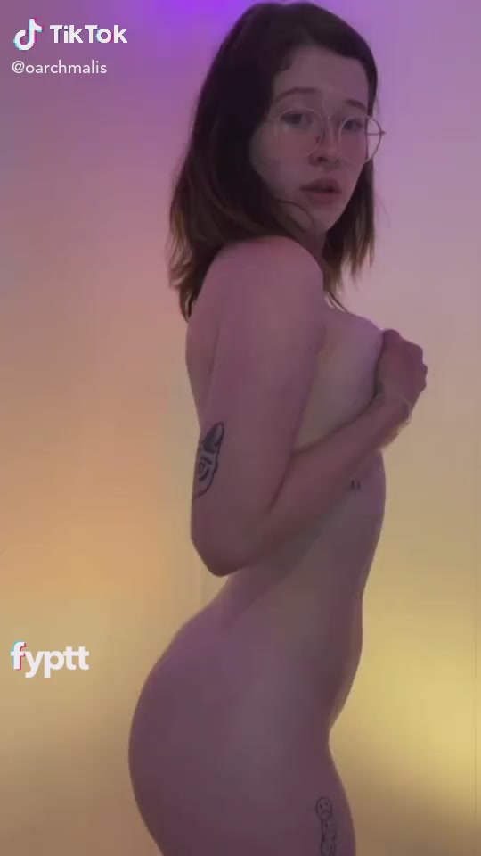 Cute Nude Girl With Glasses Vibing To TikTok Music